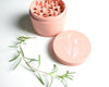pretty pink herb grinder with illustration of flowers. it says high time on it. Premium artist weed grinder